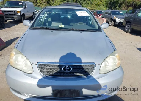 2005 Toyota Corolla Le z USA, uszkodzony, nr VIN 2T1BR30E85C444185
